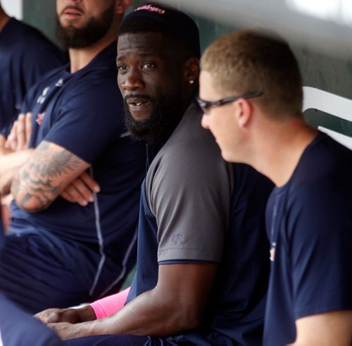 PHIL HOSSACK / WINNIPEG FREE PRESS  -  Reggie Abercrombie (centre) sits in the dugout Thursday waiting for batting practice to start. See Mike McIntyre's story..  -  July 27, 2017