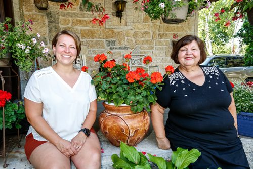 JUSTIN SAMANSKI-LANGILLE / WINNIPEG FREE PRESS
Liz Kovach and her daughter, Liz Jr. pose in her front yard Thursday. Kovach and her family have been an integral part of the Hungary-Pannonia pavilion at Folklorama for decades. 
170727 - Thursday, July 27, 2017.