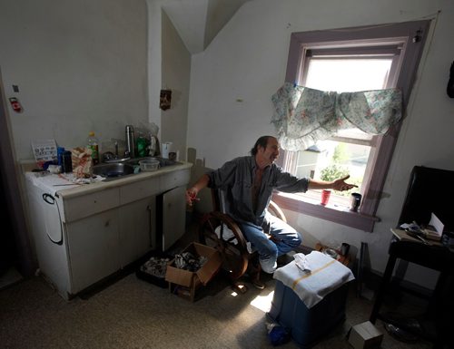 PHIL HOSSACK / WINNIPEG FREE PRESS  -   Mark Witt in his 2 room "suite"  at a North End rooming house, gesturing while describing his fate since an assault left him in a coma, and now in failing health. See Mike McIntylre's story.   -  July 27, 2017