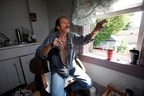 PHIL HOSSACK / WINNIPEG FREE PRESS  -   Mark Witt in his 2 room "suite"  at a North End rooming house, gesturing while describing his fate since an assault left him in a coma, and now in failing health. See Mike McIntylre's story.   -  July 27, 2017