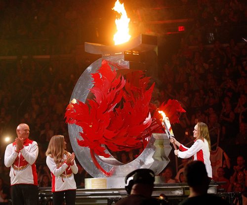 PHIL HOSSACK / WINNIPEG FREE PRESS  - Cindy Klassen lights the cauldron at the Canada Games Opening Ceremonies at the Bell MTS Place Friday evening.  -  July 28, 2017