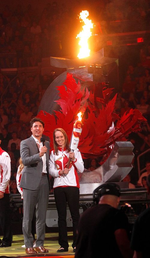 PHIL HOSSACK / WINNIPEG FREE PRESS  -  Prime Minister Justin Trudeau and Cindy Klassen beam back at the fans at the Canada Games Opening Ceremonies at the Bell MTS Place Friday evening.  -  July 28, 2017