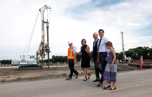 PHIL HOSSACK / WINNIPEG FREE PRESS  -  .Left to Right, Mike Peters of Bird Construction, Margaret Redmond and Hartley Richardson of the Assiniboine  Park Conservancy along with PM Justin Trudeau and his daughter Ella-Grace tour the future site of Canada's Diversity Gardens Saturday Morning.  -  July 29, 2017