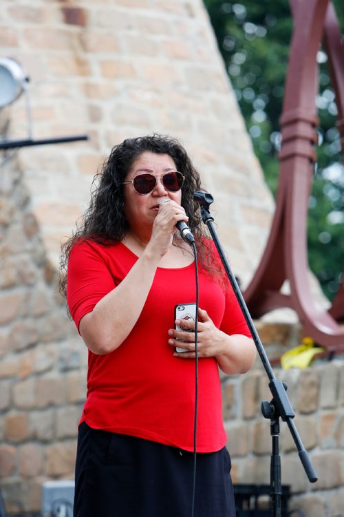 JUSTIN SAMANSKI-LANGILLE / WINNIPEG FREE PRESS
Indigenous artist Rhonda Head performs Saturday at the Forks Oodena Circle as part of the 9th annual No Stone Unturned benefit concert for Manitoba's murdered and missing.
170729 - Saturday, July 29, 2017.