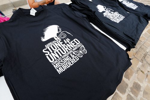 JUSTIN SAMANSKI-LANGILLE / WINNIPEG FREE PRESS
No Stone Unturned t-shirts are seen for sale Saturday at the Forks Oodena Circle during the 9th annual No Stone Unturned benefit concert for Manitoba's murdered and missing.
170729 - Saturday, July 29, 2017.