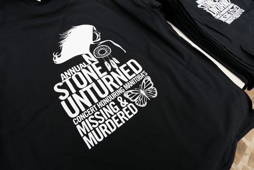 JUSTIN SAMANSKI-LANGILLE / WINNIPEG FREE PRESS
No Stone Unturned t-shirts are seen for sale Saturday at the Forks Oodena Circle during the 9th annual No Stone Unturned benefit concert for Manitoba's murdered and missing.
170729 - Saturday, July 29, 2017.