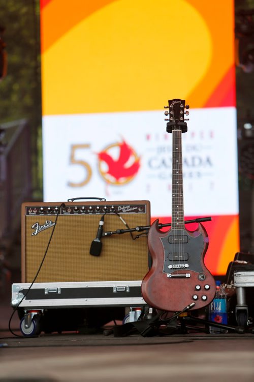 JUSTIN SAMANSKI-LANGILLE / WINNIPEG FREE PRESS
A guitar and amp are seen, with the Canada Games logo on a screen in the background, on the main stage of the Canada Games Festival Saturday at The Forks.
170729 - Saturday, July 29, 2017.