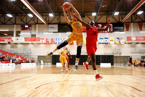 JUSTIN SAMANSKI-LANGILLE / WINNIPEG FREE PRESS
Team Manitoba's Nina Becker and Ontario's Xianna Josephs battle in the air during Saturday's women's basketball game.
170729 - Saturday, July 29, 2017.