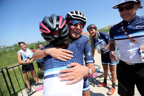 TREVOR HAGAN / WINNIPEG FREE PRESS
Quebec mountain biker Anne-Julie Tremblay, right, being congratulated by teammates after becoming the first to win a gold medal at the 2017 Canada Summer Games, Sunday, July 30, 2017.