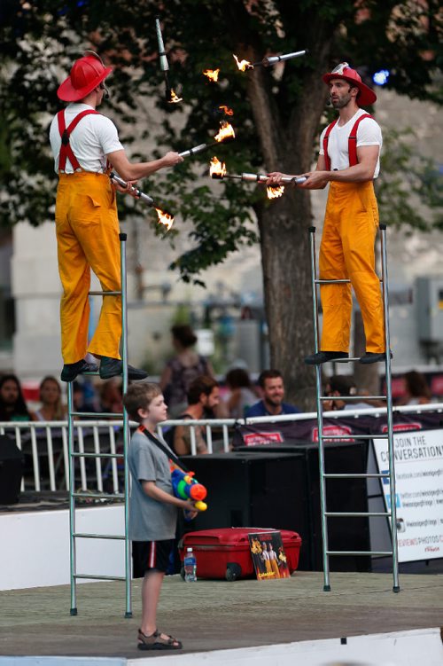 JOHN WOODS / WINNIPEG FREE PRESS
Circus Firemen perform with the help of Solomon Young at the Fringe Sunday, July 30, 2017.