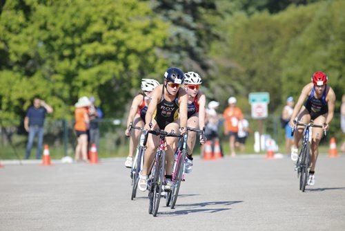 JUSTIN SAMANSKI-LANGILLE / WINNIPEG FREE PRESS
Manitoban Kyla Roy leads the peloton during the cycling stage at Monday's women's triathlon at Birds Hill Park. Roy finished third in the competition behind two athletes from B.C.
170731 - Monday, July 31, 2017.