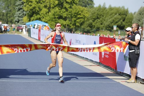 JUSTIN SAMANSKI-LANGILLE / WINNIPEG FREE PRESS
B.C. athelete Desirae Ridenour crosses the finish line during Monday's women's triathlon and Birds Hill Park. Ridenour finished first, with teammate Hannah Henry and Manitoba's Kayla Roy finishing second and third respectively.
170731 - Monday, July 31, 2017.