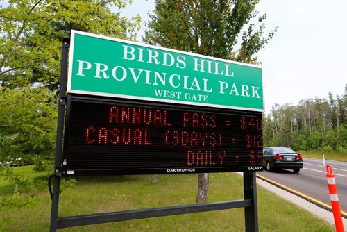 JUSTIN SAMANSKI-LANGILLE / WINNIPEG FREE PRESS
The entrance sign to Birds Hill Park at the East Gate is seen Monday displaying the costs of day, casual and annual vehicle park passes.
170731 - Monday, July 31, 2017.