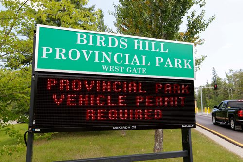 JUSTIN SAMANSKI-LANGILLE / WINNIPEG FREE PRESS
The entrance sign to Birds Hill Park at the East Gate is seen Monday displaying a message indicating that vehicles must have a park pass to enter the park.
170731 - Monday, July 31, 2017.