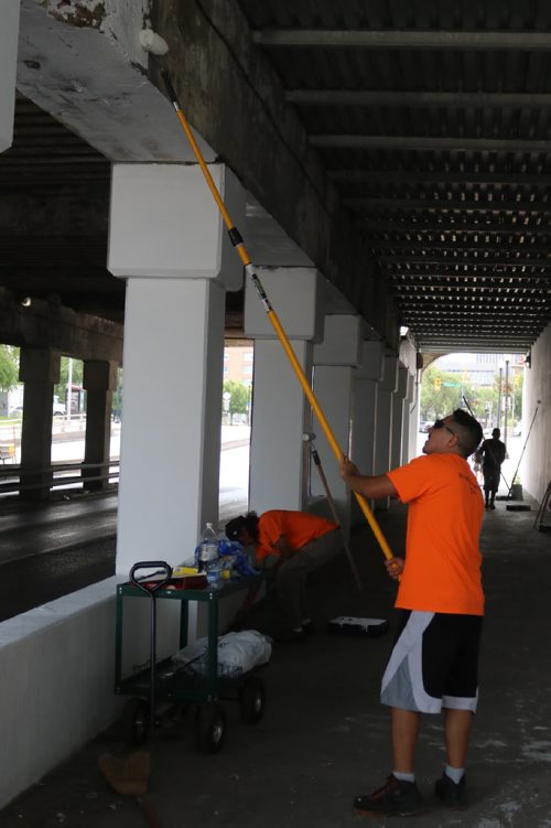 Canstar Community News July 20, 2017 - Volunteers paint the CPR underpass on Main Streert white to make it safer for pedestrians. (LIGIA BRAIDOTTI/CANSTAR COMMUNITY NEWS/TIMES)