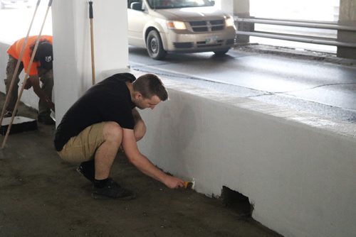 Canstar Community News July 20, 2017 - Volunteer paint the CPR trails underpass on Main Street to make it safer for pedestrians. (LIGIA BRAIDOTTI/CANSTAR COMMUNITY NEWS/TIMES)