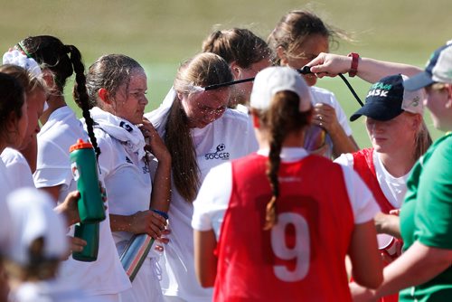 JOHN WOODS / WINNIPEG FREE PRESS
Saskatchewan players are sprayed with ice water during a first half water break during their Canada Summer Games soccer match against Quebec in Winnipeg, Monday, July 31, 2017.