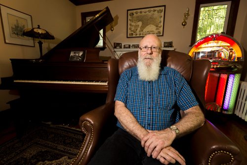JUSTIN SAMANSKI-LANGILLE / WINNIPEG FREE PRESS
Alan Turner poses in his living room with a player piano and juke box in the background. Turner has over 15 automatic instruments in his personal collection and is the president of the Automatic Musical Instruments Collectors Association.
170727 - Thursday, July 27, 2017.