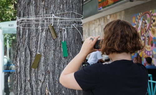 MIKE DEAL / WINNIPEG FREE PRESS
Winnipeg writer Ariel Gordon spent July 29 & 30 on the Tallest Poppy's patio, writing poems to the boulevard elm and inviting passersby to add their own thoughts/poems/secrets. The project was the 26th residency organized by Synonym Art Consultation at the Sherbrook Street restaurant and also included a writing workshop on Sunday night.
170729 - Saturday, July 29, 2017.