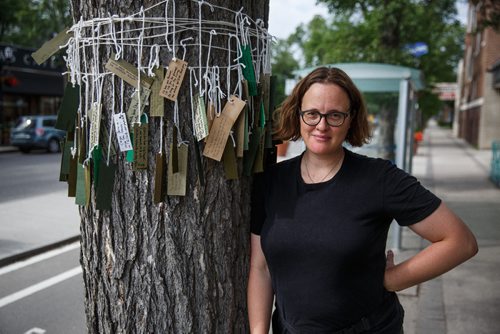 MIKE DEAL / WINNIPEG FREE PRESS
Winnipeg writer Ariel Gordon spent July 29 & 30 on the Tallest Poppy's patio, writing poems to the boulevard elm and inviting passersby to add their own thoughts/poems/secrets. The project was the 26th residency organized by Synonym Art Consultation at the Sherbrook Street restaurant and also included a writing workshop on Sunday night.
170729 - Saturday, July 29, 2017.