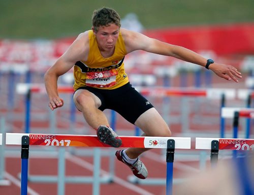 BORIS MINKEVICH / WINNIPEG FREE PRESS
Jackson Penner is from The Pas who is doing well in the Decathlon event. Here he competes in the 110m Hurdles. Track and field events held at the University of Manitoba Stadium. August 1, 2017