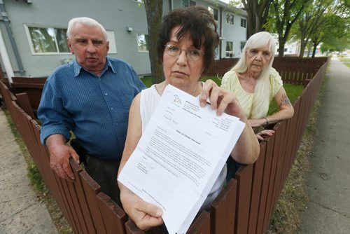 JOHN WOODS / WINNIPEG FREE PRESS
From left, Chucky Brunette, Irene Soko and Bev Forbes are photographed in front of their Manitoba Housing complex in Winnipeg, Tuesday, August 1, 2017. Brunette is helping his friends, Soko and Forbes, who are being moved out of their current homes to apartment blocks they consider to be in dangerous areas of the city.