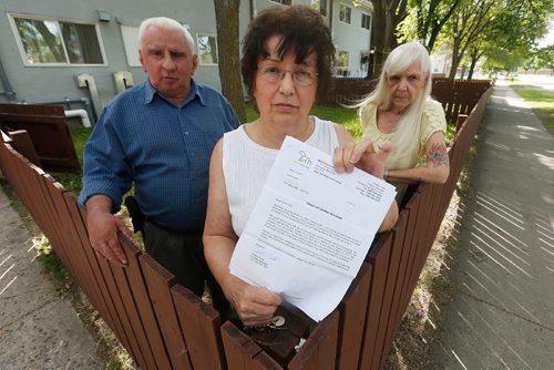 JOHN WOODS / WINNIPEG FREE PRESS
From left, Chucky Brunette, Irene Soko and Bev Forbes are photographed in front of their Manitoba Housing complex in Winnipeg, Tuesday, August 1, 2017. Brunette is helping his friends, Soko and Forbes, who are being moved out of their current homes to apartment blocks they consider to be in dangerous areas of the city.1