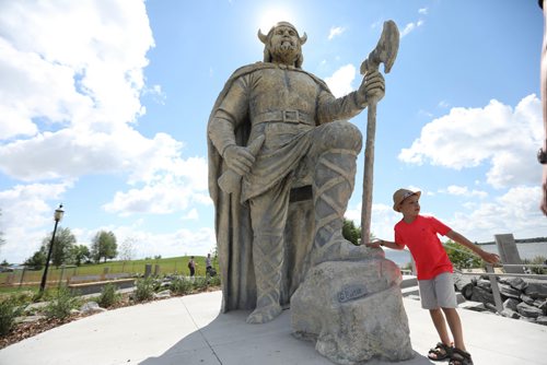 RUTH BONNEVILLE / WINNIPEG FREE PRESS

Gimli opens new space to house their giant statue of a Viking called Viking Park just prior to the Gimli Icelandic Festival this weekend.  
Six-year-old Bentley Gray checks out the Viking statue in the newly created park Wednesday.  
See Ashley Prest story.  

  
July 28,, 2017