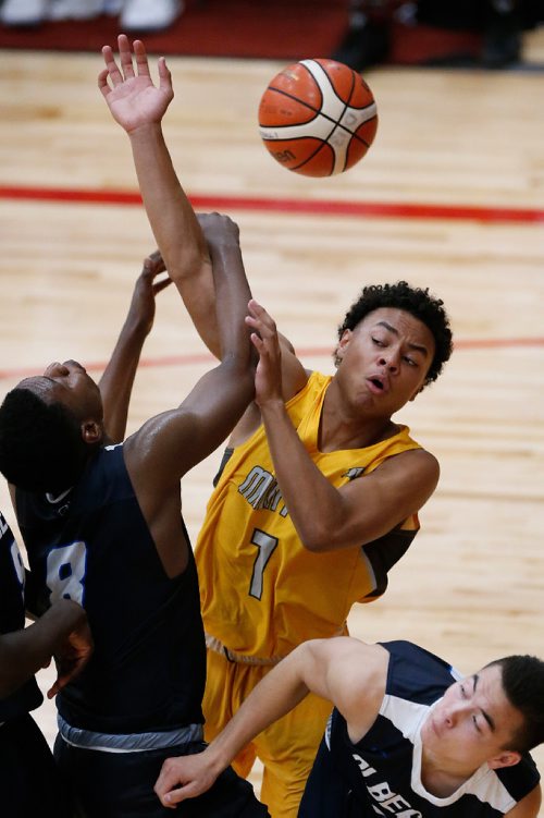 JOHN WOODS / WINNIPEG FREE PRESS
Manitoba's Malachi Alexander (7) blocks Alberta's Rele Orimalade (8) in the quarter finals of the Canada Games at the Duckworth Centre in Winnipeg, Tuesday, August 1, 2017.