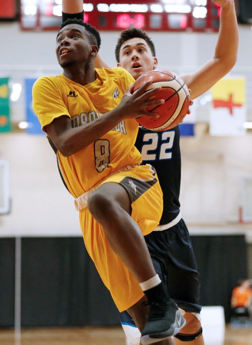 JOHN WOODS / WINNIPEG FREE PRESS
Manitoba's Mark Tachie (8) drives past Alberta's Alex Jap (22) in the quarter finals of the Canada Games at the Duckworth Centre in Winnipeg, Tuesday, August 1, 2017.