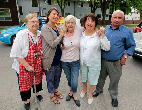 BORIS MINKEVICH / WINNIPEG FREE PRESS
Gilbert Park residence got word that they can stay in their apartments. From left, Doreen Thomas, Barb Desjarlais(Doreen's daughter), Bev Forbes , Irene Soko, and Chuckie Brunette. August 2, 2017