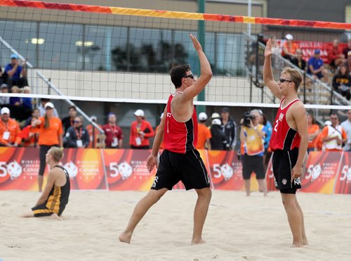 TREVOR HAGAN / WINNIPEG FREE PRESS
Team British Columbias Jeff Webb (1) and Isaac Bevis (2) celebrate after defeating Team Manitoba during their beach volleyball match at Sargent Park, Wednesday, August 2, 2017.