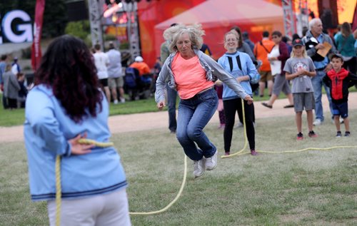 TREVOR HAGAN / WINNIPEG FREE PRESS
Lorraine Gaudet from St.Claude, Manitoba, trying out some jump rope with the youth ambassadors from the North West Territories, at The Forks on the Northern Territories night, Wednesday, August 2, 2017.