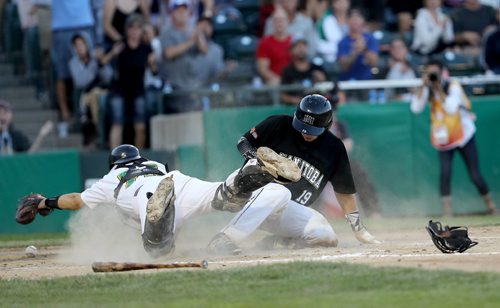 TREVOR HAGAN / WINNIPEG FREE PRESS
Team Saskatchewan's Brandon Logan can't stop the ball as Team Manitoba's Jon Patmore slides into home, Friday, August, 4, 2017.