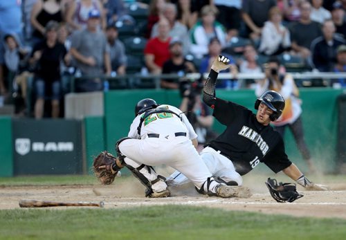 TREVOR HAGAN / WINNIPEG FREE PRESS
Team Saskatchewan's Brandon Logan can't stop the ball as Team Manitoba's Jon Patmore slides into home, Friday, August, 4, 2017.