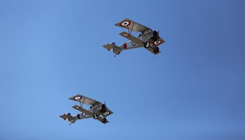 TREVOR HAGAN / WINNIPEG FREE PRESS 
Replica Nieuport 11 planes from the First World War fly by the Royal Canadian Aviation Museum, Saturday, August 5, 2017.