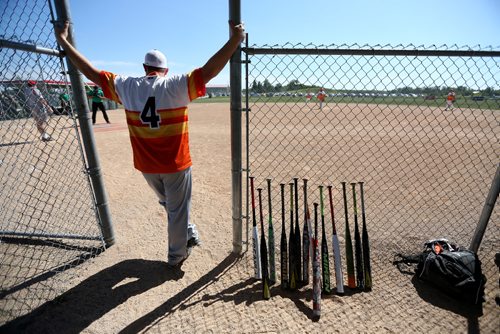 TREVOR HAGAN / WINNIPEG FREE PRESS
Terry Mitchell of the Prides Thunder from Swift Current, Saskatchewan, watches as his team plays the Pitch Slappers, from Abbotsford, BC during Slow Pitch Nationals at Little Mountain Sportsplex, Sunday, August 6, 2017.