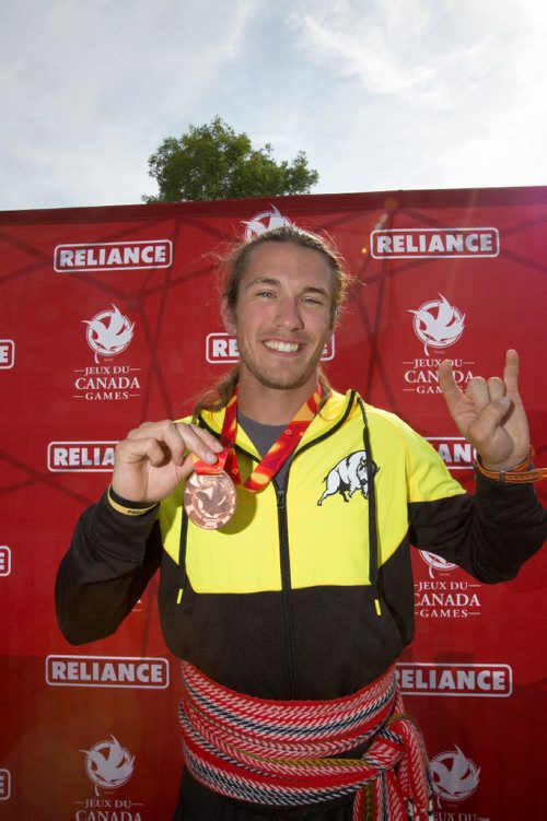 JUSTIN SAMANSKI-LANGILLE / WINNIPEG FREE PRESS
Team Manitoba's James Lavallée poses with his medal Monday after completing his races at the Manitoba Canoe and Kayak Centre.
170807 - Monday, August 07, 2017.