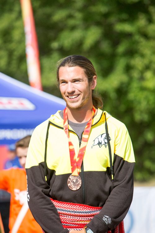 JUSTIN SAMANSKI-LANGILLE / WINNIPEG FREE PRESS
Team Manitoba's James Lavallée poses with his medal on the podium Monday after completing his races at the Manitoba Canoe and Kayak Centre.
170807 - Monday, August 07, 2017.