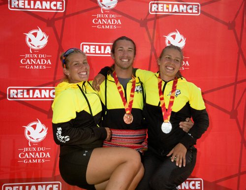 JUSTIN SAMANSKI-LANGILLE / WINNIPEG FREE PRESS
Team Manitoba's James Lavallée (C) poses with twins Emma Mitchell (L) and Maddy Mitchell (R) Monday after completing their races at the Manitoba Canoe and Kayak Centre.
170807 - Monday, August 07, 2017.