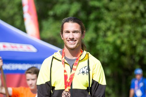 JUSTIN SAMANSKI-LANGILLE / WINNIPEG FREE PRESS
Team Manitoba's James Lavallée poses with his medal on the podium Monday after completing his races at the Manitoba Canoe and Kayak Centre.
170807 - Monday, August 07, 2017.