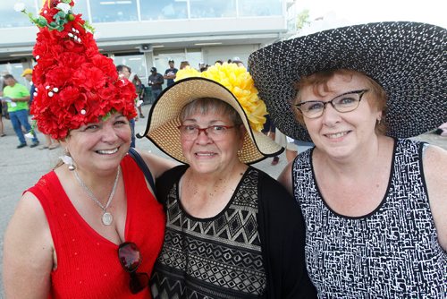 JOHN WOODS / WINNIPEG FREE PRESS
The Duncans, from left, Suzanne, Pat and Ann wear fancy hats at the Manitoba Derby at Assiniboia Downs Monday, August 7, 2017. The Derby winner Plentiful is owned by Murray Duncan.