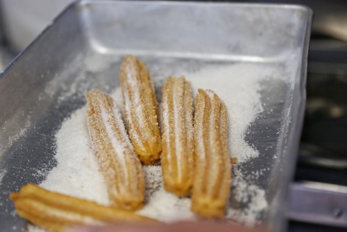 MIKE DEAL / WINNIPEG FREE PRESS

Jacko Garcia makes a churro in his food truck The Churro Stop during a media call promoting the upcoming ManyFest and the Food Truck Wars event which takes place in Memorial Park September 8-10. 

170808
Tuesday, August 08, 2017