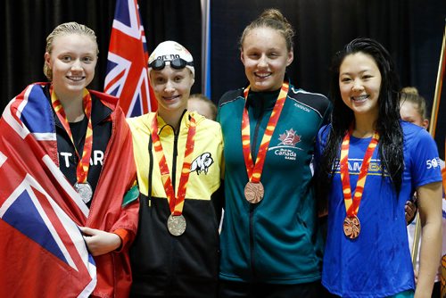 JOHN WOODS / WINNIPEG FREE PRESS
Manitoba swimmer Oksana Chaput, second from left, won Canada Games gold in the 100m women's freestyle at the Pan Am Pool and is photographed with other medalists, from left, Ontarios Hanna Henderson, NBs B Douthwright and BCs Jessica Luo Tuesday, August 8, 2017.