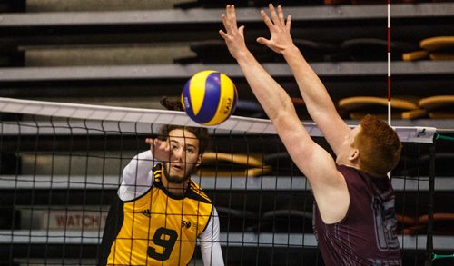 MIKE DEAL / WINNIPEG FREE PRESS
Team Manitoba mens volleyball team plays against Team Newfoundland Wednesday morning at Investors Group Athletics Centre.
Manitoba' Ryan Smith (9) spikes the ball past Newfoundlands' Jonah Winter (12) during game play.
170809 - Wednesday, August 09, 2017.
