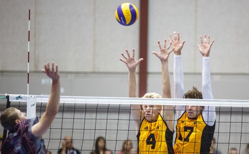 MIKE DEAL / WINNIPEG FREE PRESS
Team Manitoba mens volleyball team plays against Team Newfoundland Wednesday morning at Investors Group Athletics Centre.
Manitoba' Jon Laube (4) and Brendan Warren (17) go up for the block during game play.
170809 - Wednesday, August 09, 2017.