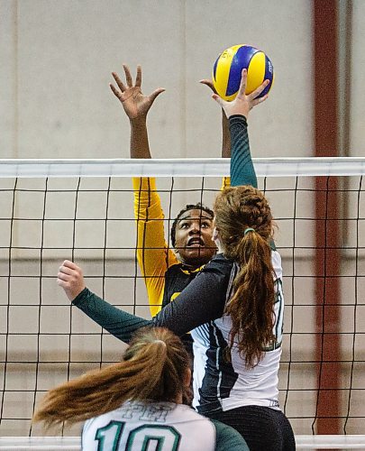 MIKE DEAL / WINNIPEG FREE PRESS

Team Manitoba women's volleyball team plays against Team PEI Wednesday afternoon at Investors Group Athletics Centre.

Manitoba' Light Uchechukwu (19) blocks a shot by PEI' Callie MacDonald (12) during game action.

170809 - Wednesday, August 09, 2017.