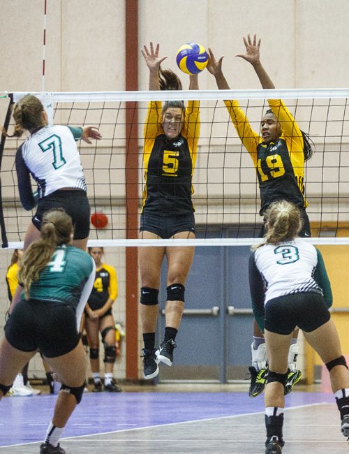 MIKE DEAL / WINNIPEG FREE PRESS
Team Manitoba women's volleyball team plays against Team PEI Wednesday afternoon at Investors Group Athletics Centre.
Manitoba' Julia Tays (5) and Light Uchechukwu (19) leap to block a shot by PEI' Mary Lowther (7) during game action.
170809 - Wednesday, August 09, 2017.
