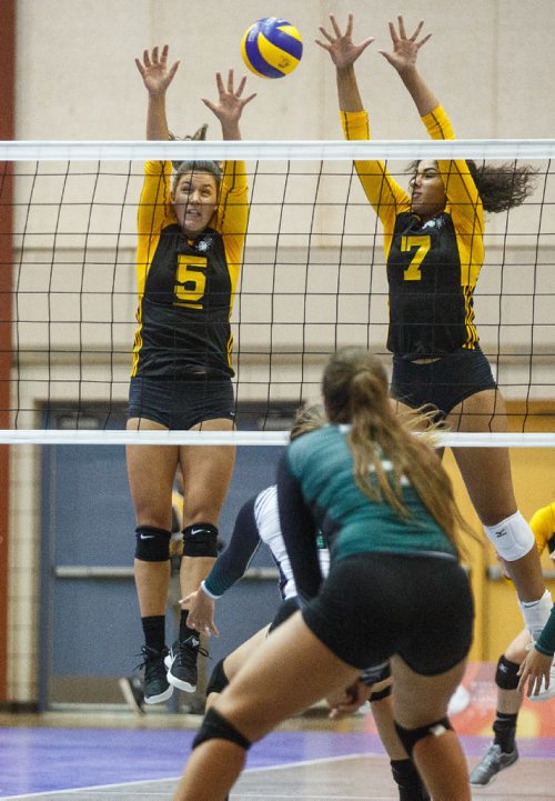MIKE DEAL / WINNIPEG FREE PRESS
Team Manitoba women's volleyball team plays against Team PEI Wednesday afternoon at Investors Group Athletics Centre.
Manitoba' Julia Tays (5) and Laura Hill (7) leap to block a shot during game action.
170809 - Wednesday, August 09, 2017.