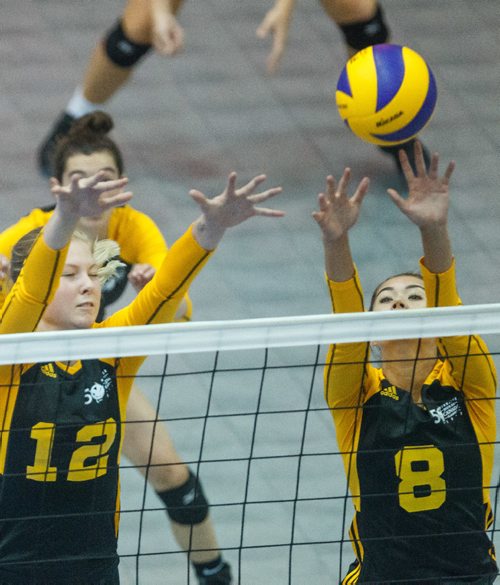 MIKE DEAL / WINNIPEG FREE PRESS
Team Manitoba women's volleyball team plays against Team PEI Wednesday afternoon at Investors Group Athletics Centre.
Manitoba' Averie Allard (12) and Tori Isfjord (8) leap to block the ball during game action.
170809 - Wednesday, August 09, 2017.